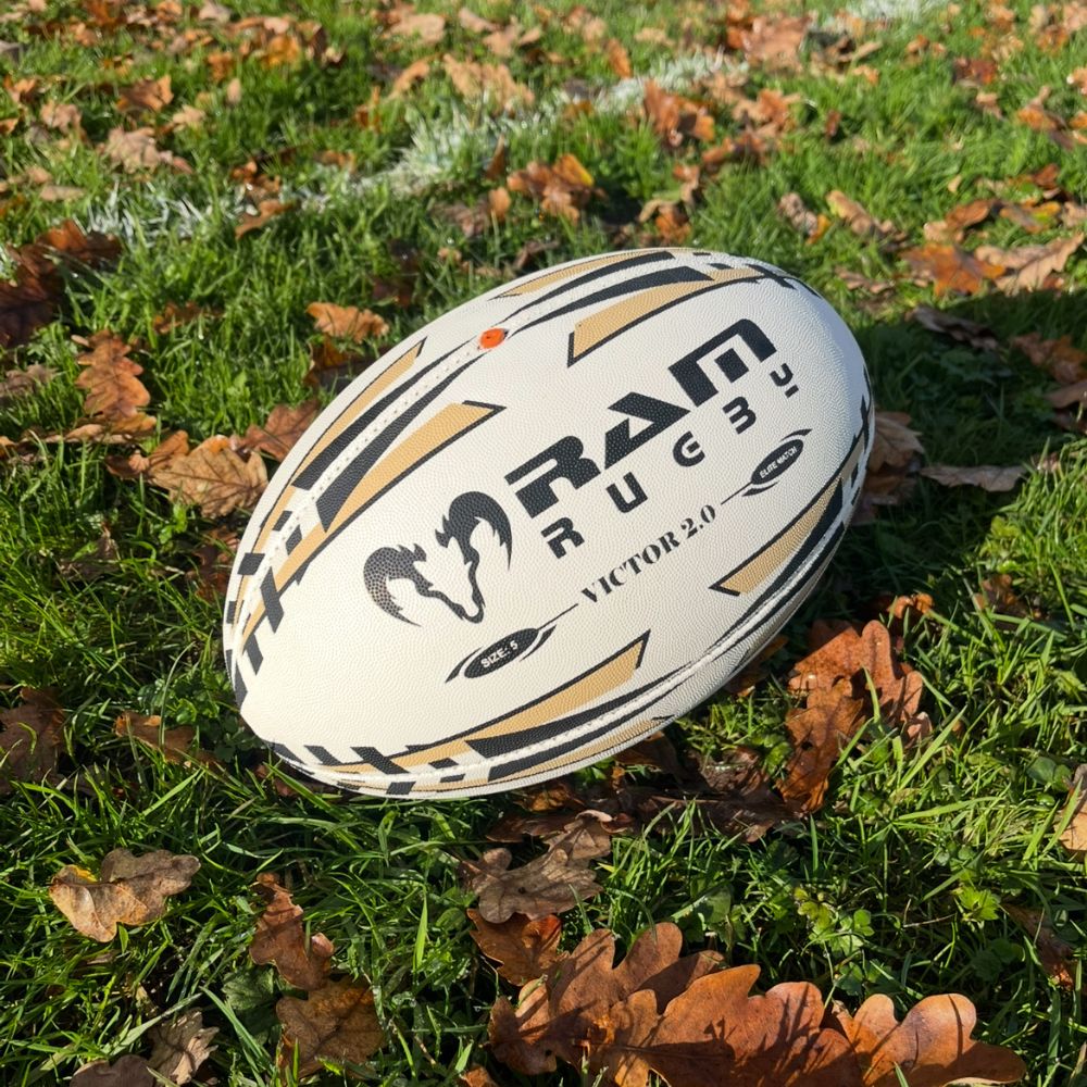Ram Rugby Victor 2.0 Elite Match Rugby Ball close-up showing durable 4-ply polycotton construction and 3D grip pattern