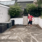 Ram Rugby Solo Skills Ball with half-flat design showing textured grip and durable synthetic outer for training practice